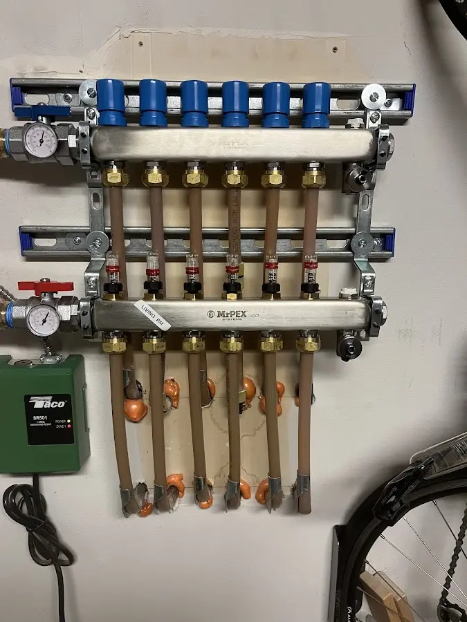 Plumber performing Water Heater Repair at a residential property in Cedarville